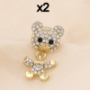 Pin's x2 nounours articulé et strass blancs 0623511 doré