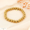 Bracelet élastique acier inoxydable grosses billes style contemporain 0223586 doré
