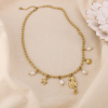 Collier acier hippocampe astérie coquillage perle 0125038 doré