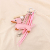 Bijou de sac ou porte-clés chien baseball métal, simili-cuir bois 0825006 rose nude