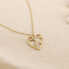 Collier en acier inoxydable cœur visage 0125133 doré