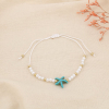 Lot de 12 bracelets fantaisie coulissants Étoile de mer et perles 0225206 multi