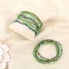 12 bracelets élastiques cristal facetté perles nacrées 0226115 vert foncé