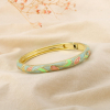 Bracelet jonc ouvrable motif feuille métal émaillé 0226235 aurore boréale