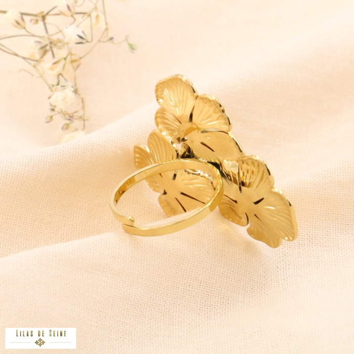 Bague large réglable acier inoxydable trois fleurs 0424061 doré