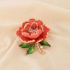 Broche épingle métal émail strass fleur stylisée 0526512 rose nude